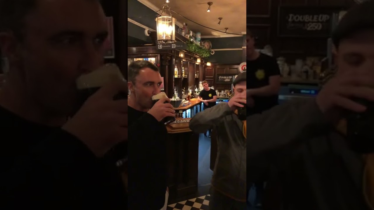 Guinness CHUGGING contest in a PUB in LONDON, UK 🇬🇧 Who wins?!