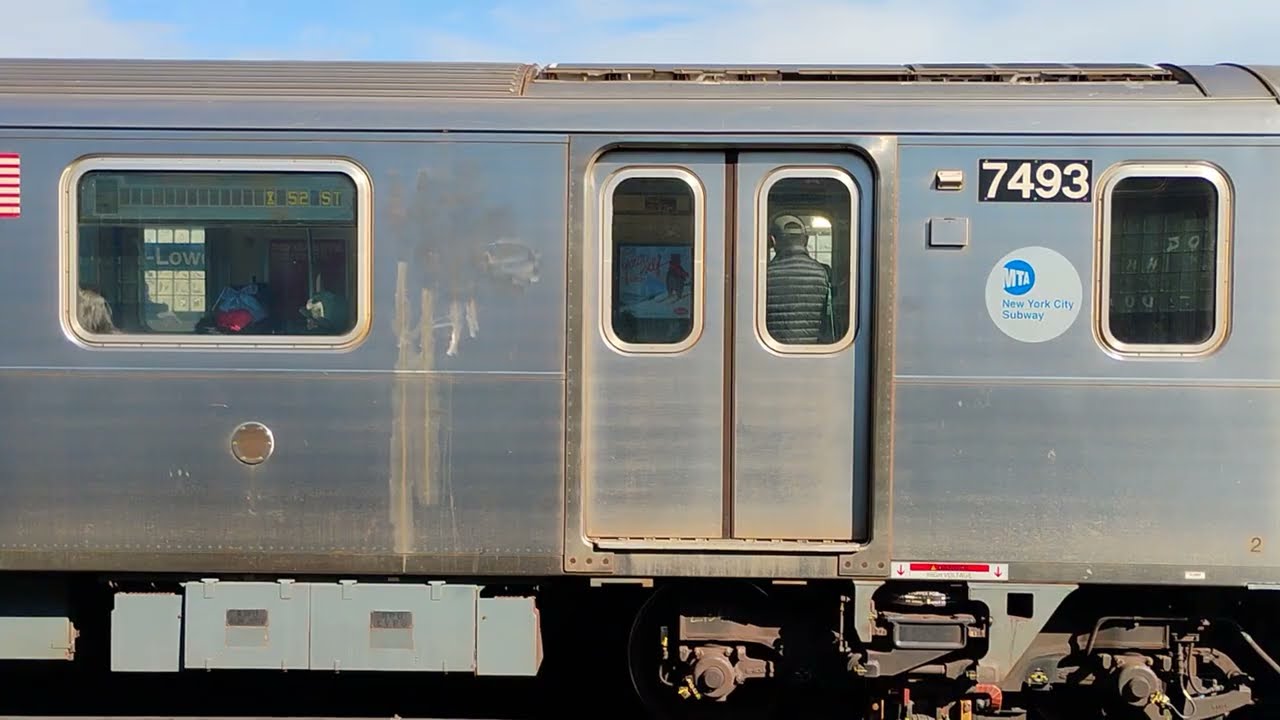 R188 #7493 (7) w/ messed up signage leaving 40 Street 