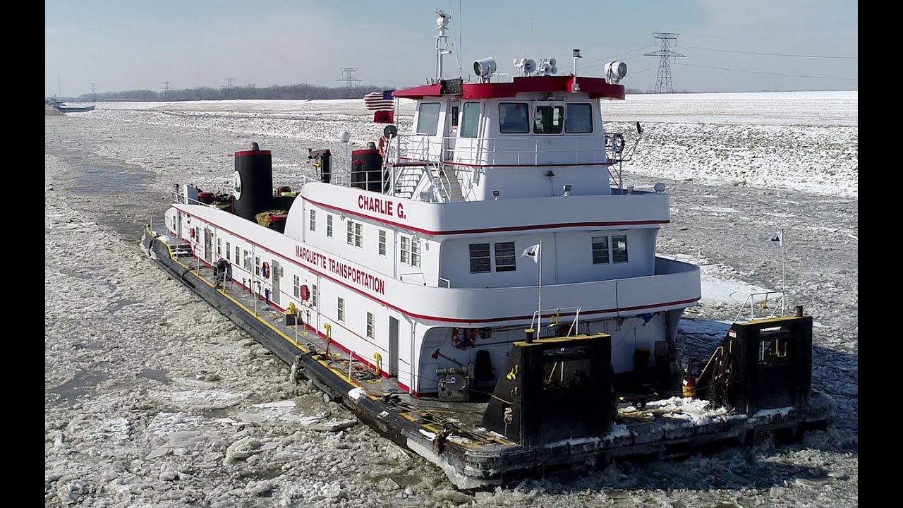 Towboat Charlie G. in the Icey Chain of Rocks Canal with Bald Eagles on the Ice