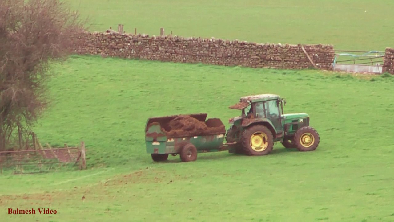 John Deere 6200 on the Muck.  Fraser spreader.