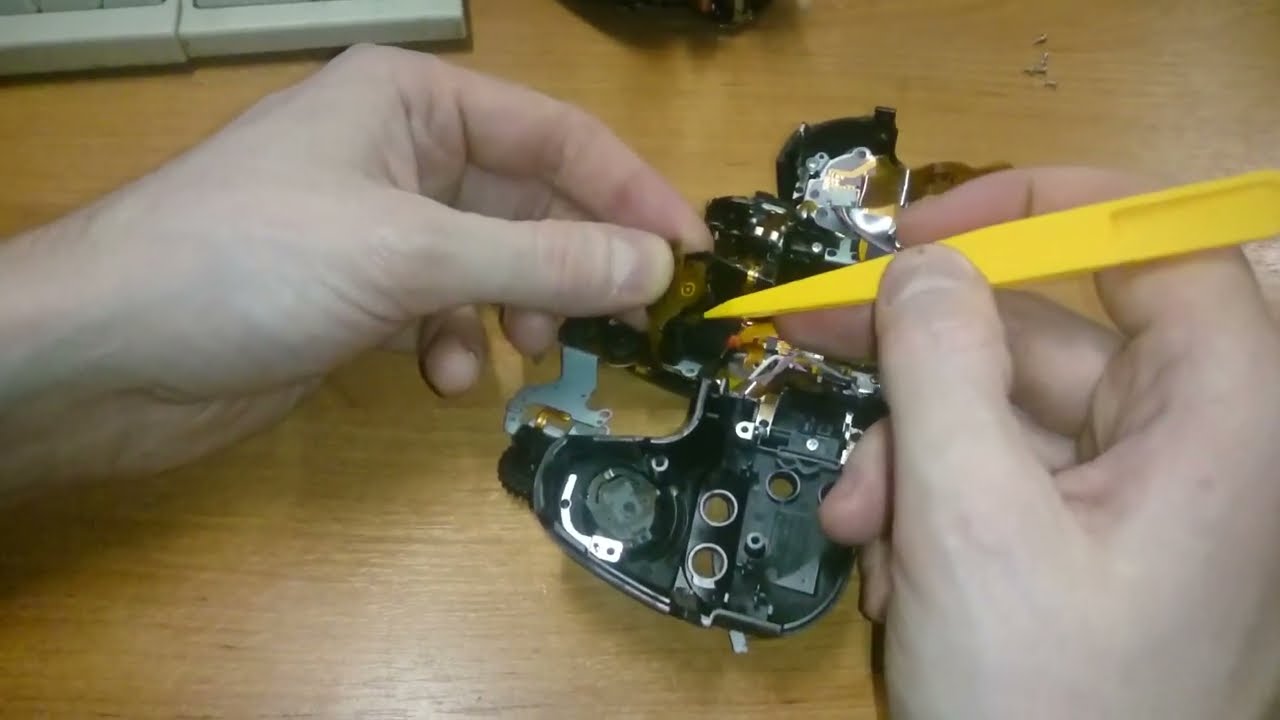 Sony Alpha DSLR-A580 repair ON/OFF + shutter button (disassembly camera and cleaning button module)