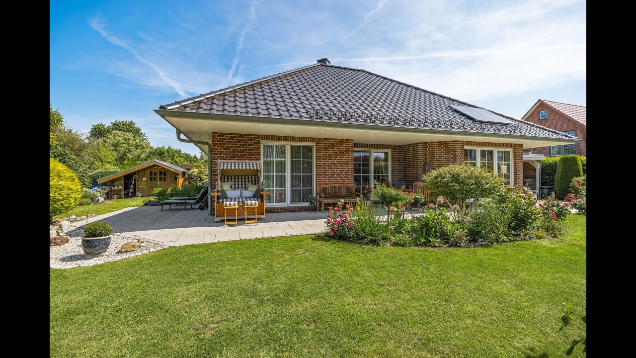 Wohlfühloase am Sackgassenende:Niedrigenergiehaus mit wunderschönem Garten, Ausbauoption und Carport
