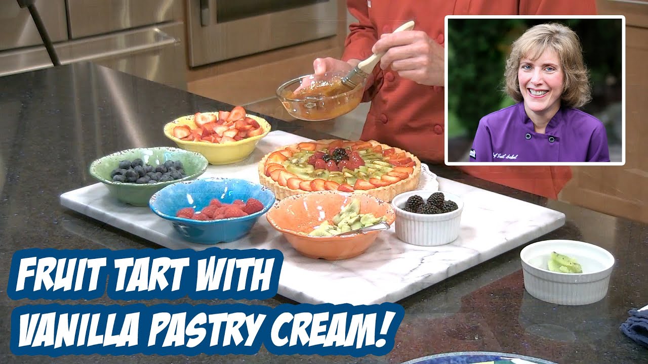 Fruit Tart Filled with Vanilla Pastry Cream and Topped with Fresh Fruit.