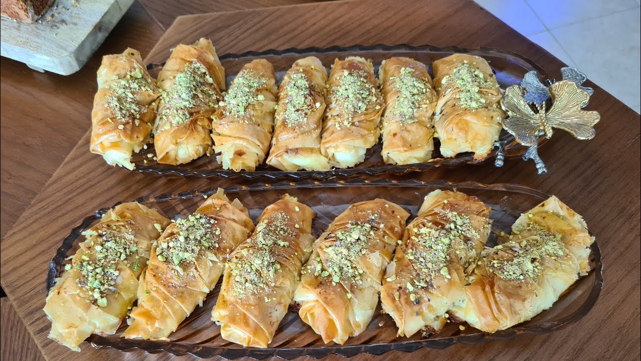 قطايف بكريمة الحامض مقادير بسيطة من أسهل ما يكون و المداق على حسابي