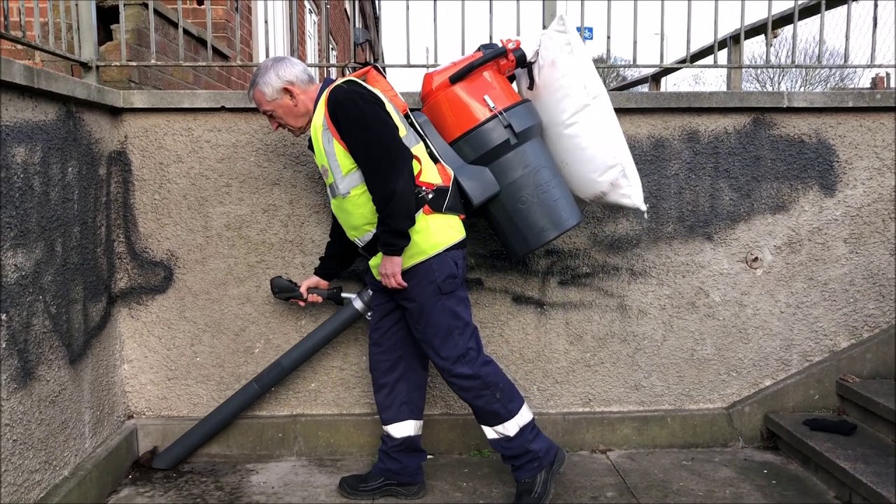 Battery Powered Backpack Litter Collector working in hard to access areas