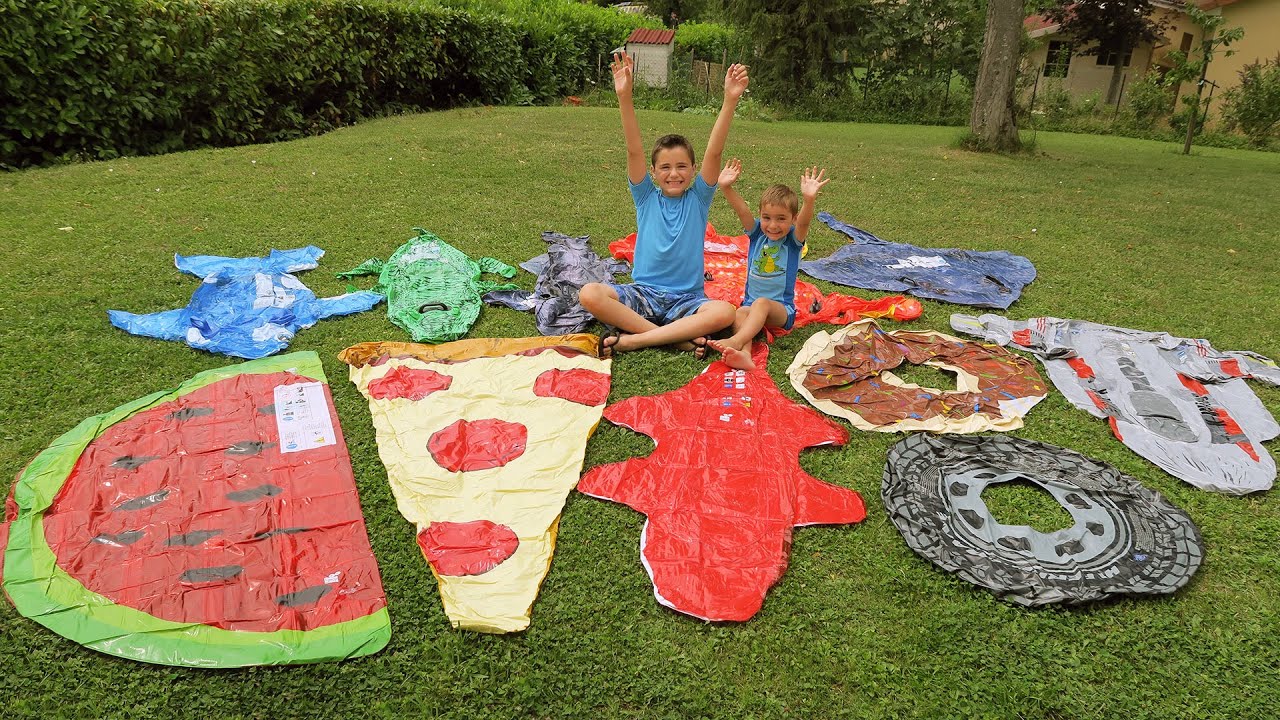 COLIS SURPRISE POUR LA PISCINE ET CASCADE DE JOUETS GONFLABLES AQUATIQUES - 1/3