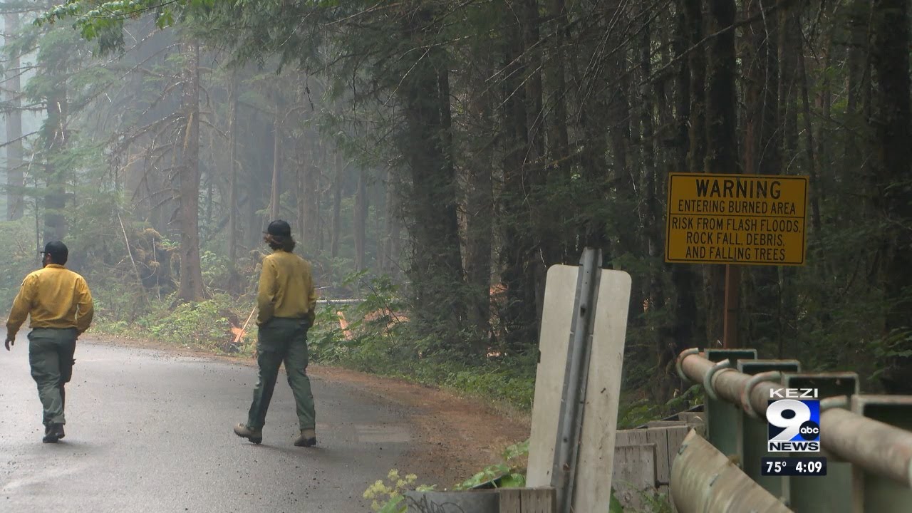 Firefighters continue to battle Ore Fire through rain