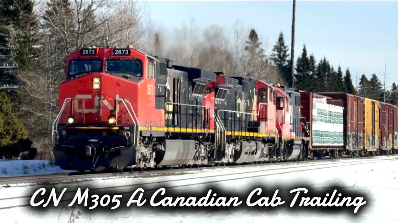 CN M305, A Canadian Cab Trailing 
