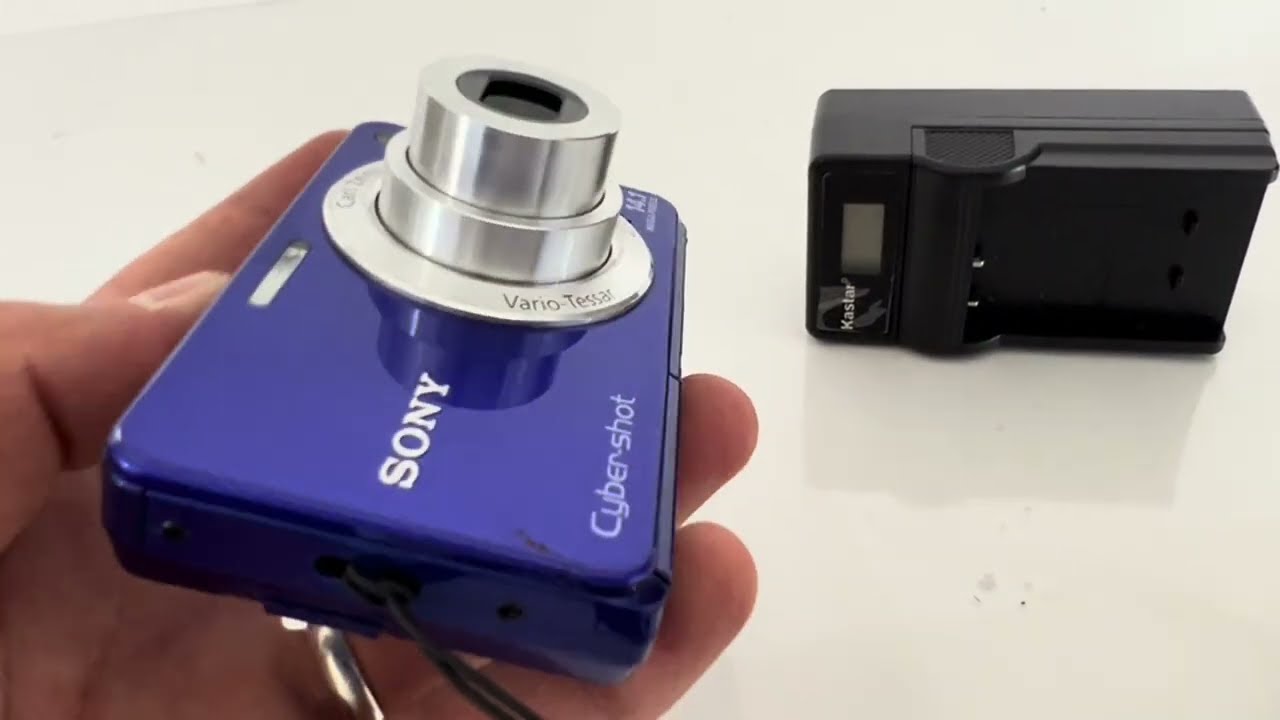 Sony Cyber-shot DSC-W560 14.1MP Digital Camera w/ Charger, SD Card, & Cgarger