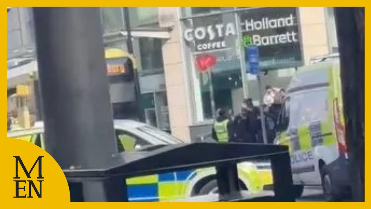 Man arrested after threatening people with broken bottle in city centre