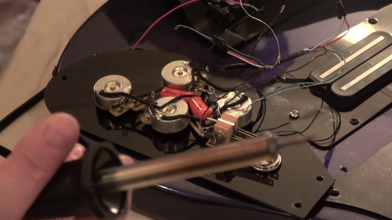 RICKENBACKER 4003S- soldering the wires. Oh what fun for you.