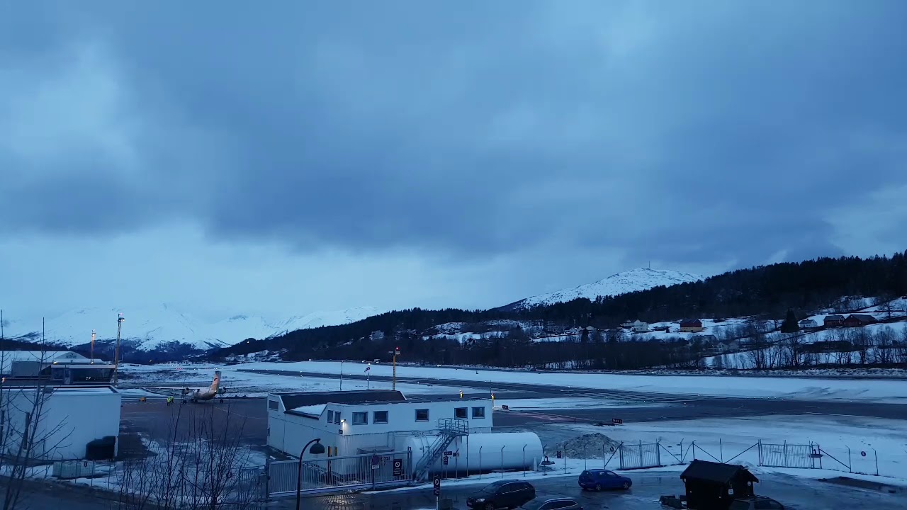 Dash wideroe taking of from Orsta  Volda airport