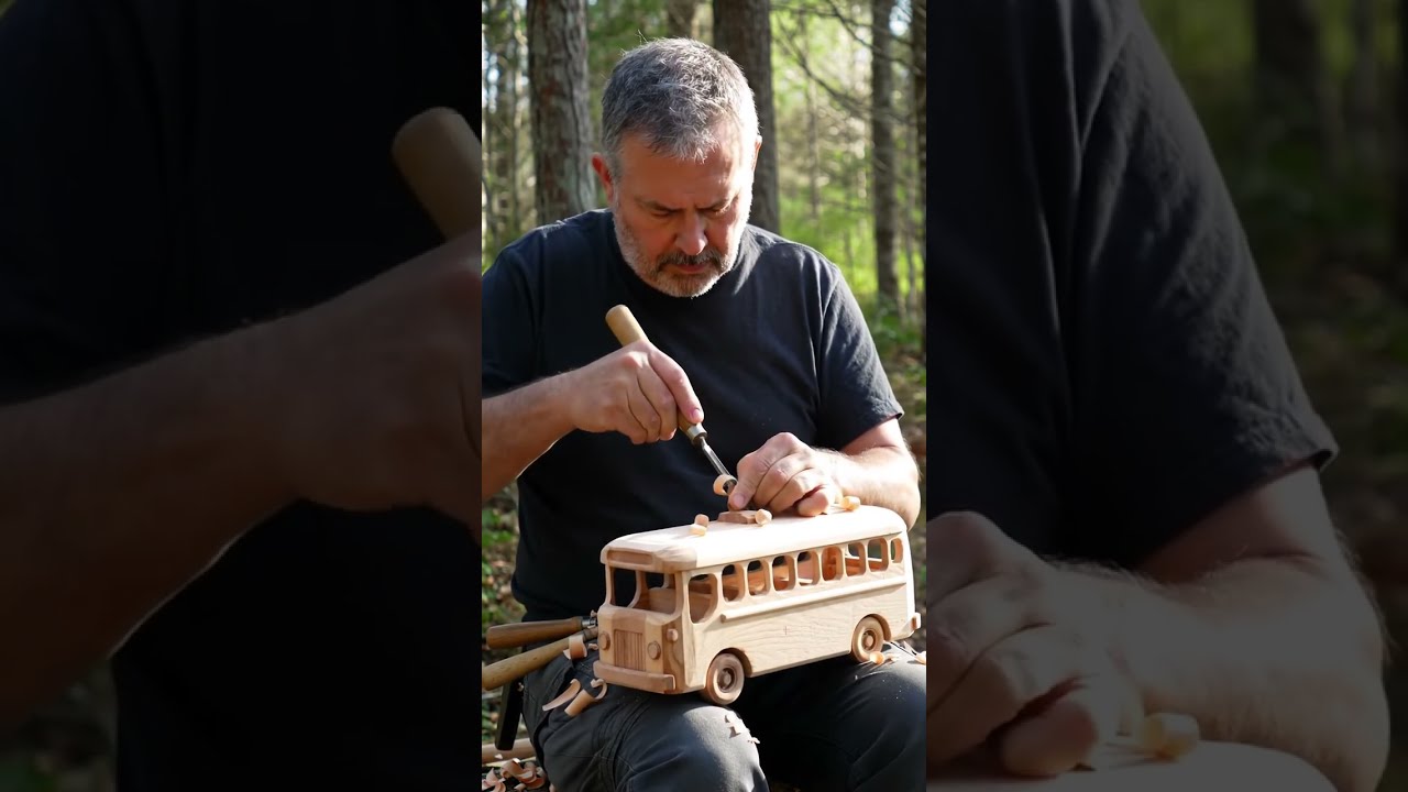man make toy bus by wooden in forest