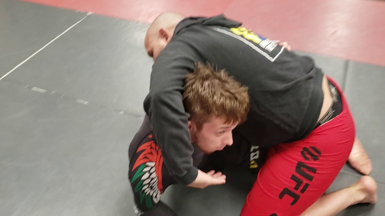 BJJ Guillotine from half guard top by Prof Fabio Holanda from Brazilian Top Team Canada HQ Montreal
