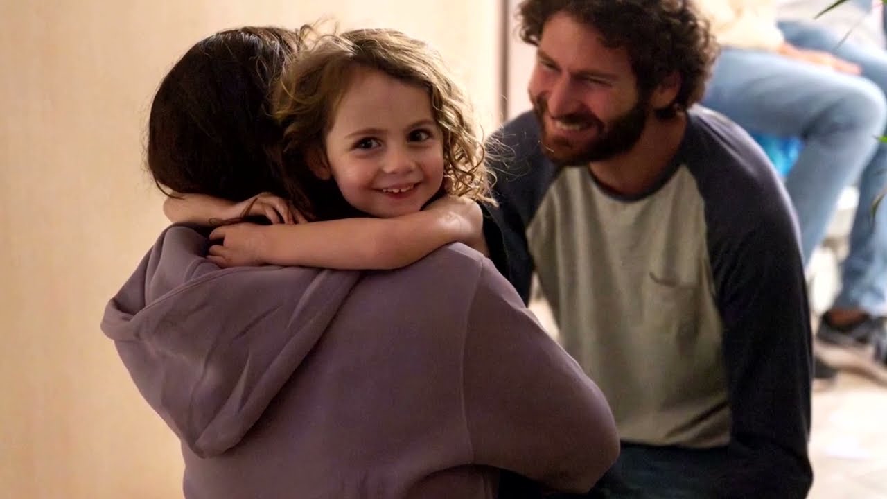 Freed hostage reunites with three year old daughter | Reuters