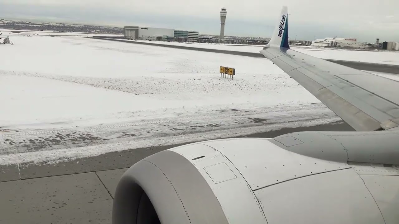 Westjet 634 taxi Calgary Airport 737 Max 8.