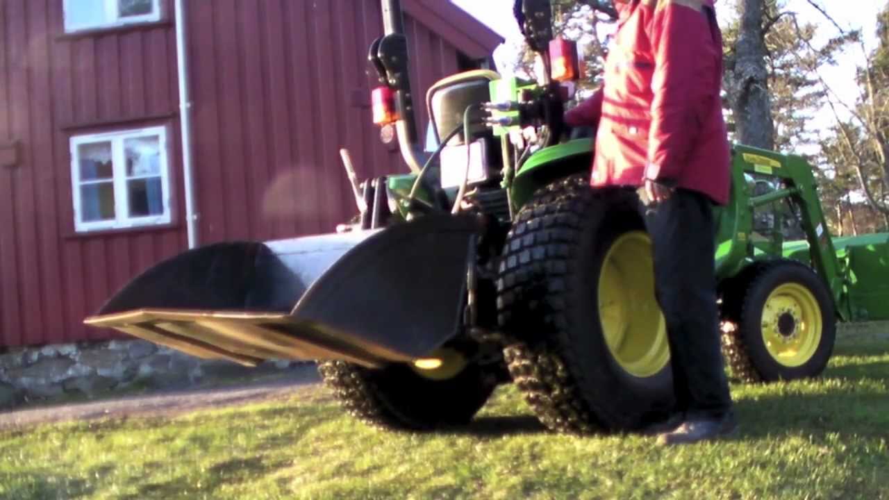John Deere 3036E - Bakskuffe