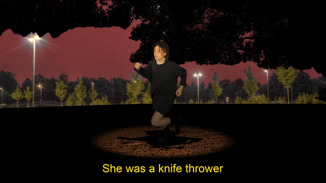 Junie & TheHutFriends - She Was A Knife Thrower [Run For Your Life, Carry A Knife] (Lyric Video)