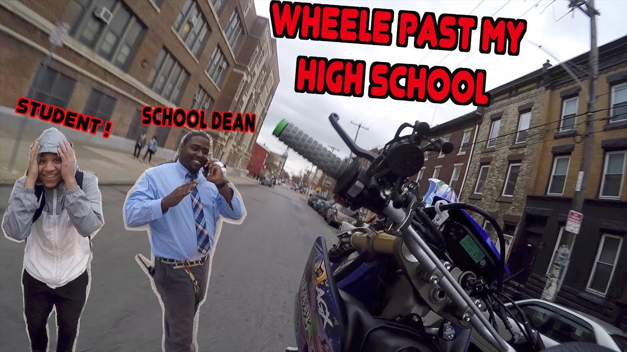 WHEELING A DIRTBIKE PASS MY HIGH SCHOOL !! | BRAAP VLOGS