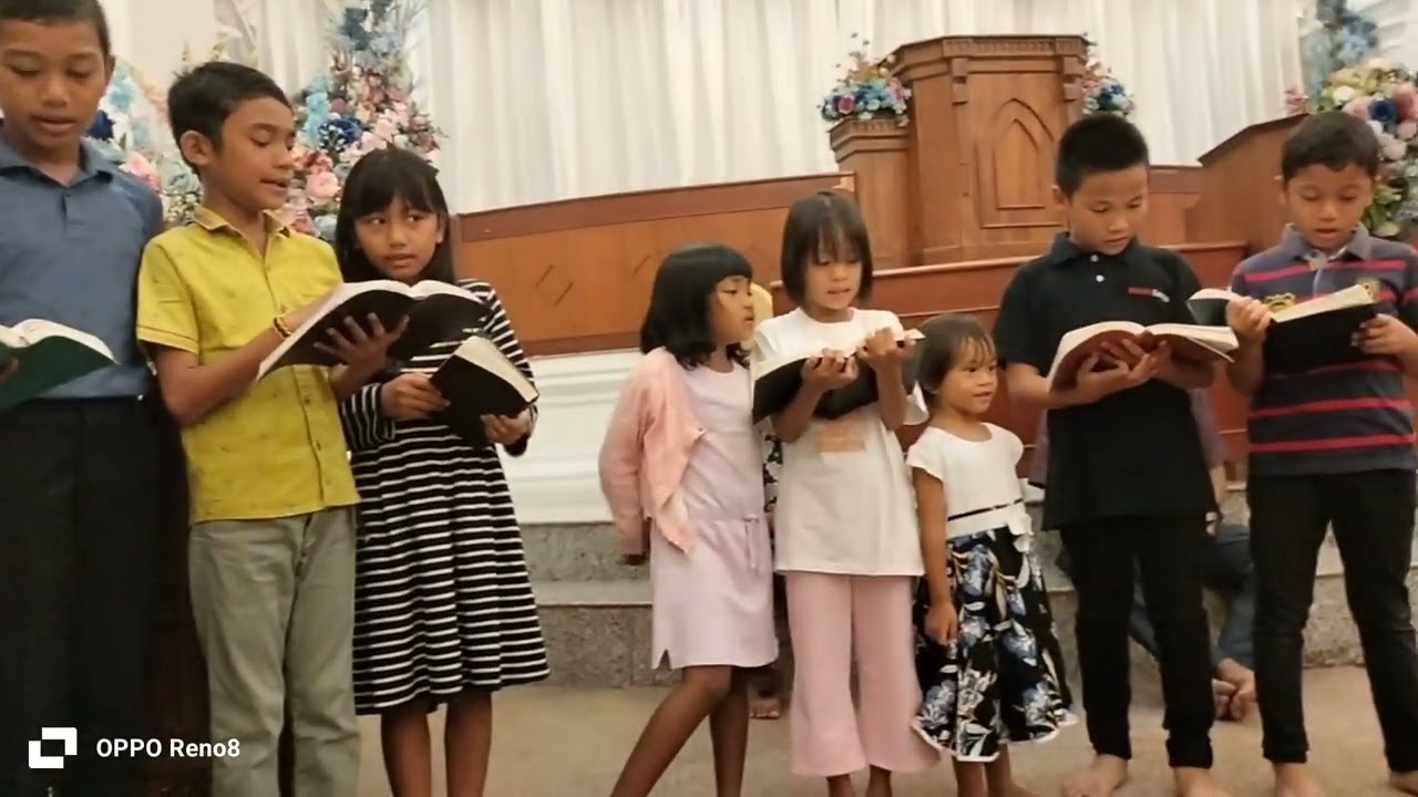 Duduk dekat kaki Yesus 
