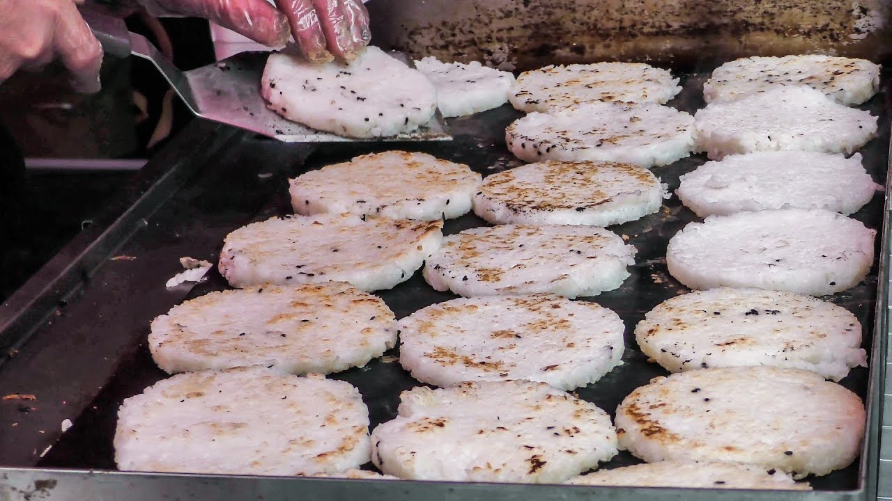 Sticky Rice Burgers with Tofu and Chicken. Curious Street Food Seen at Hyper Japan Festival, London