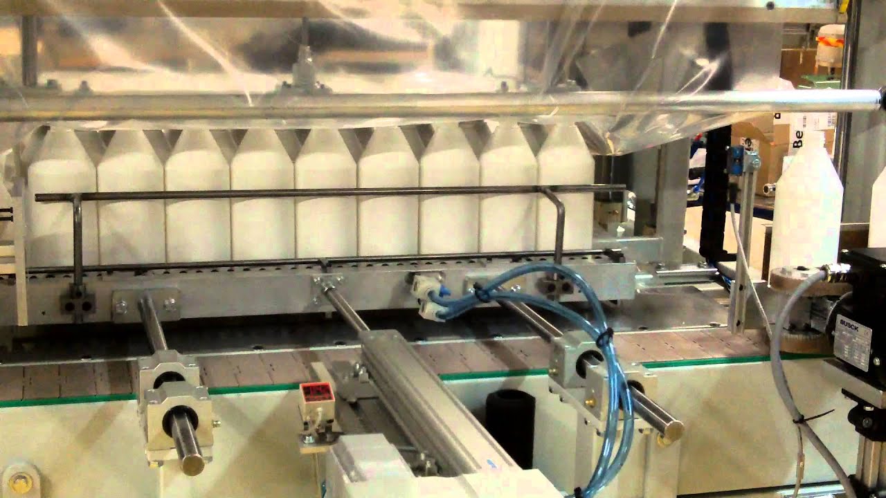 Pakkemaskine der pakker en 1 liters flaske