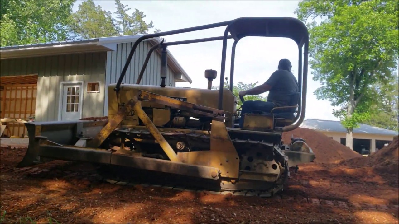 John Deere 440 Crawler Moving Dirt