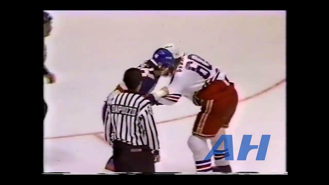 NHL Sep. 19, 1991 Louie DeBrusk,NYR v Dean Ewen,NYI New York Rangers New York Islanders