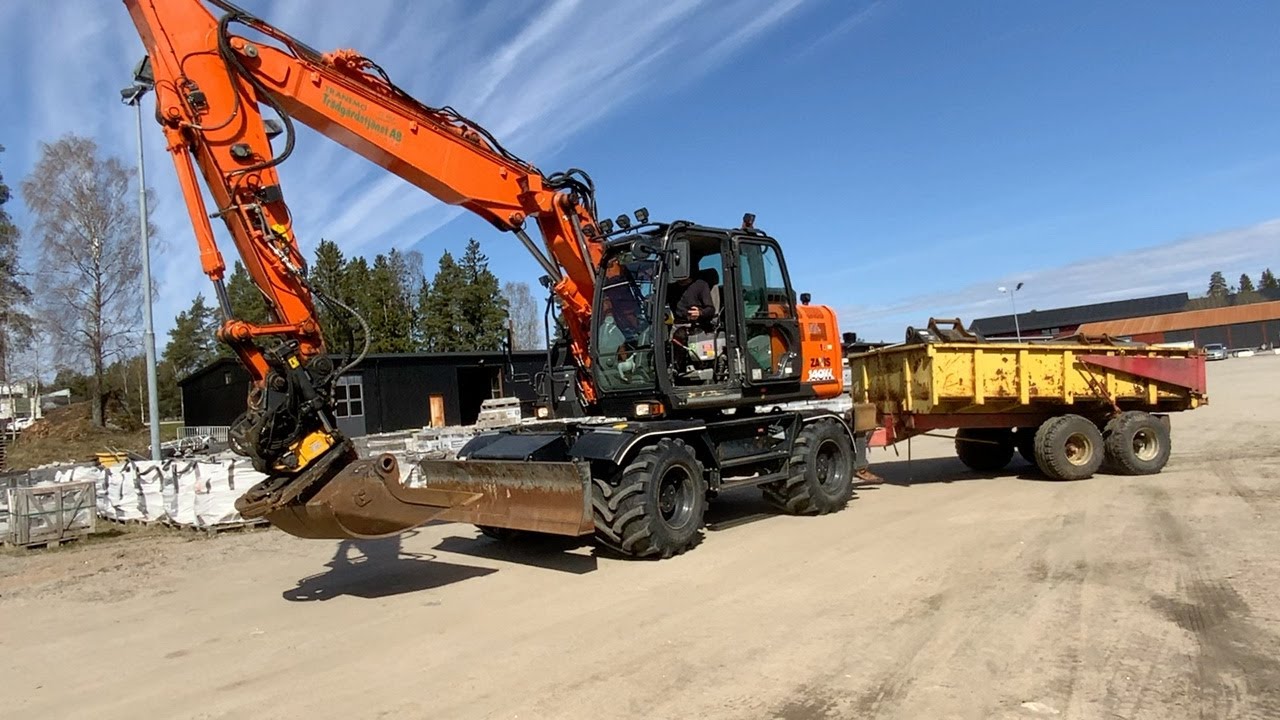 Köp Grävmaskin Hitachi ZX140W-6 med Mörekärra , tiltrotator + 8 redskap på Klaravik
