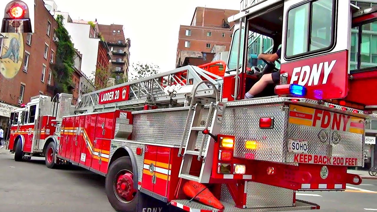 Watch Big Long Fire Truck with Rear-Wheel Steering Back Up - FDNY Ladder 20