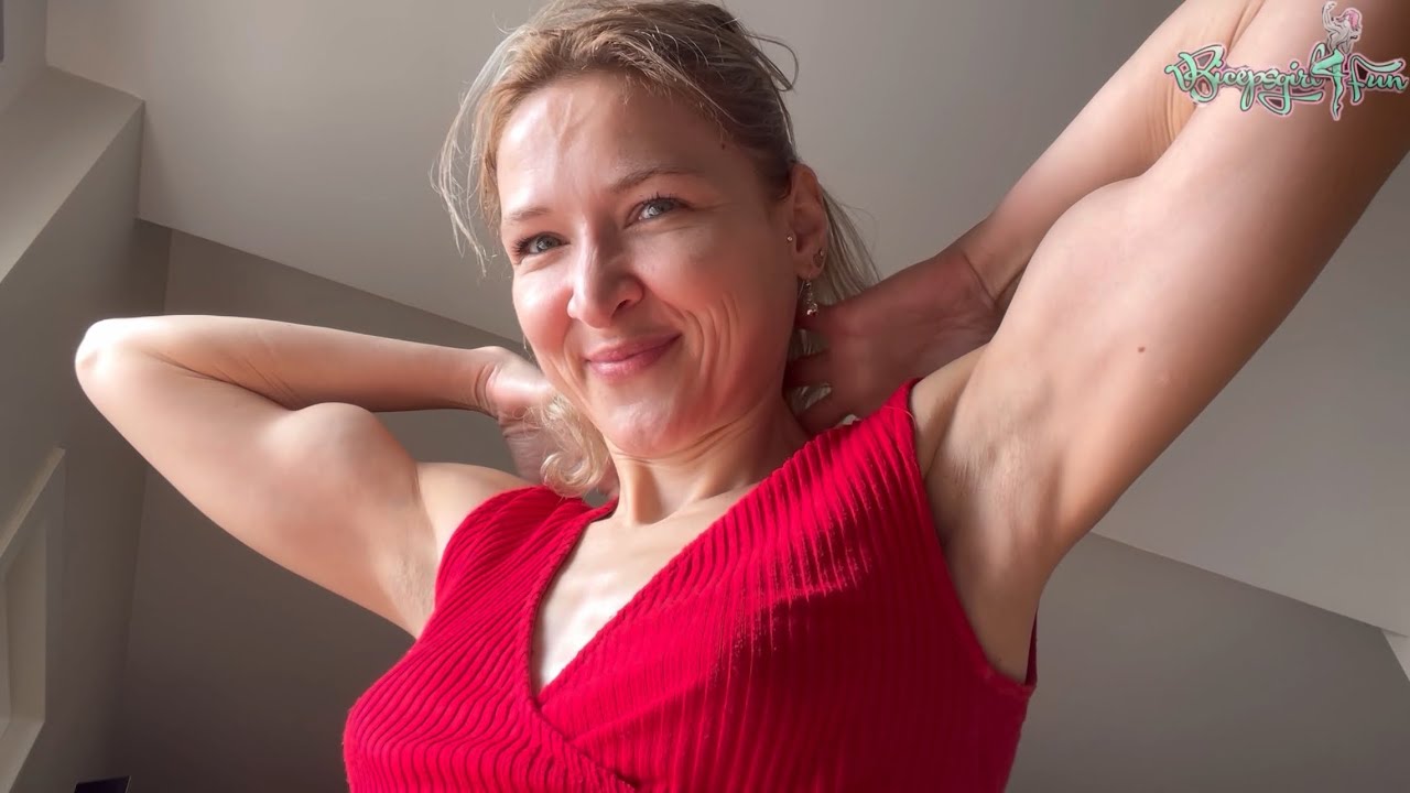 Swollen Biceps In A Red Top