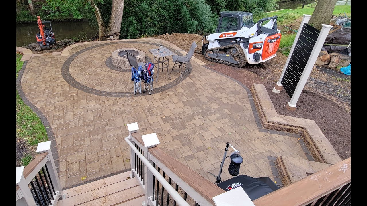 600 sq ft Paver patio installation with fire pit - time lapse