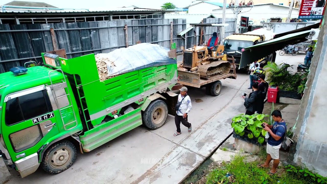 Perfectly New Activity! Landfill on Flooded Area Using Bulldozer D20P Pushing Stone with 5Ton Truck