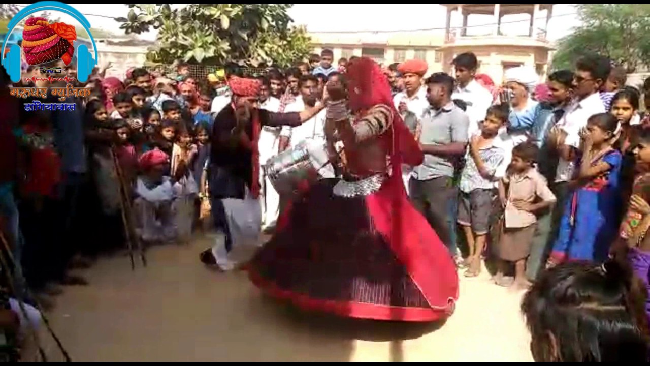 राजस्थानी औरत और बासा का  ढोल थाली  पर धांसु  नृत्य