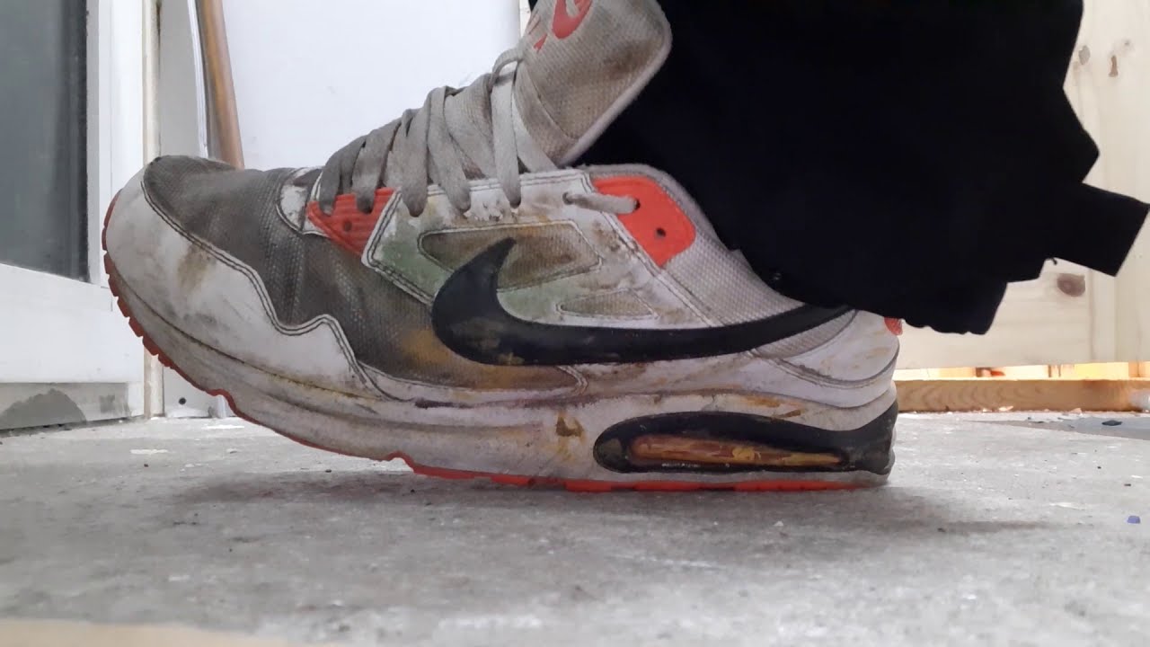 Nike Air Max Skyline white, orange and black well worn
