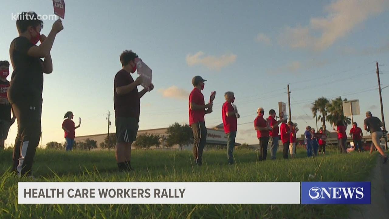 Health Care workers rally  outside the Corpus Christi Medical Center's Bay Area Hospital for better