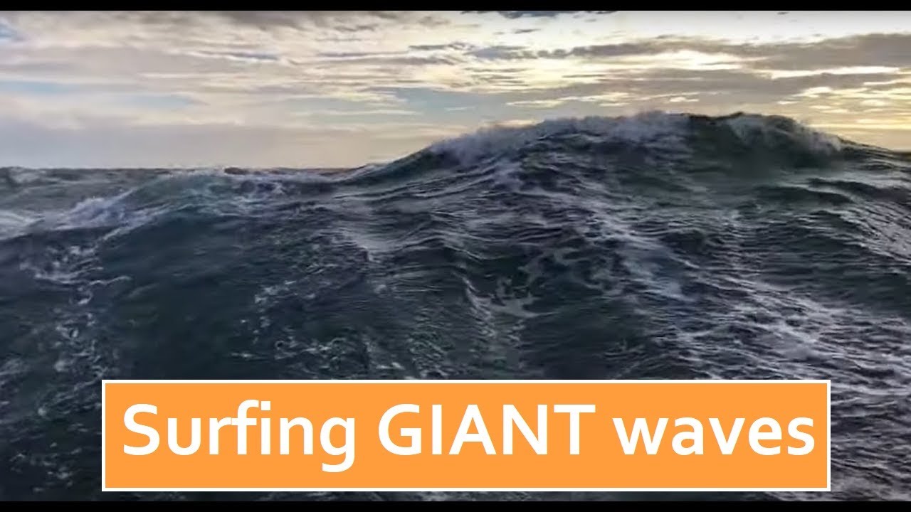 Surfing GIANT waves in a gale