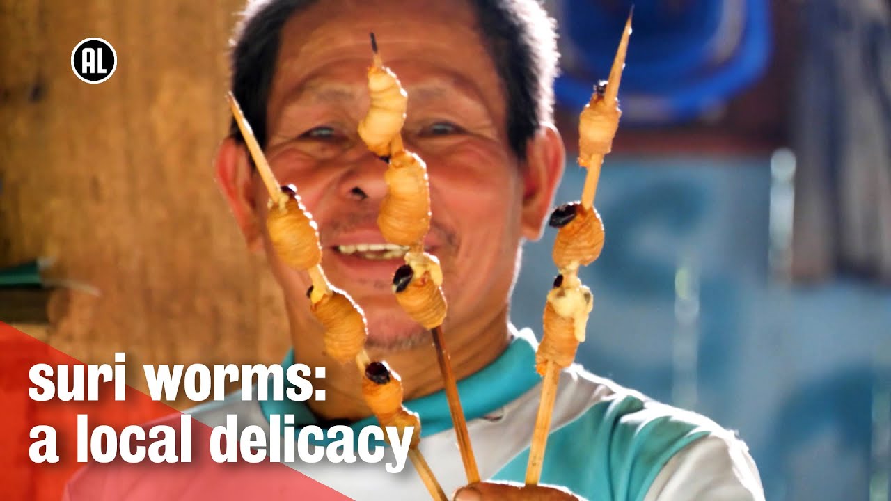 Eating larvae on a stick in Peru | METROPOLIS