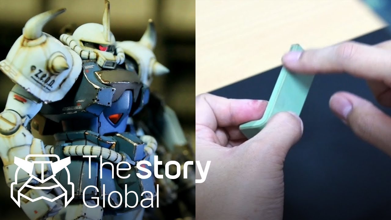 The Quality of weathering is enormous! A man painting a Gunpla with his fingers.