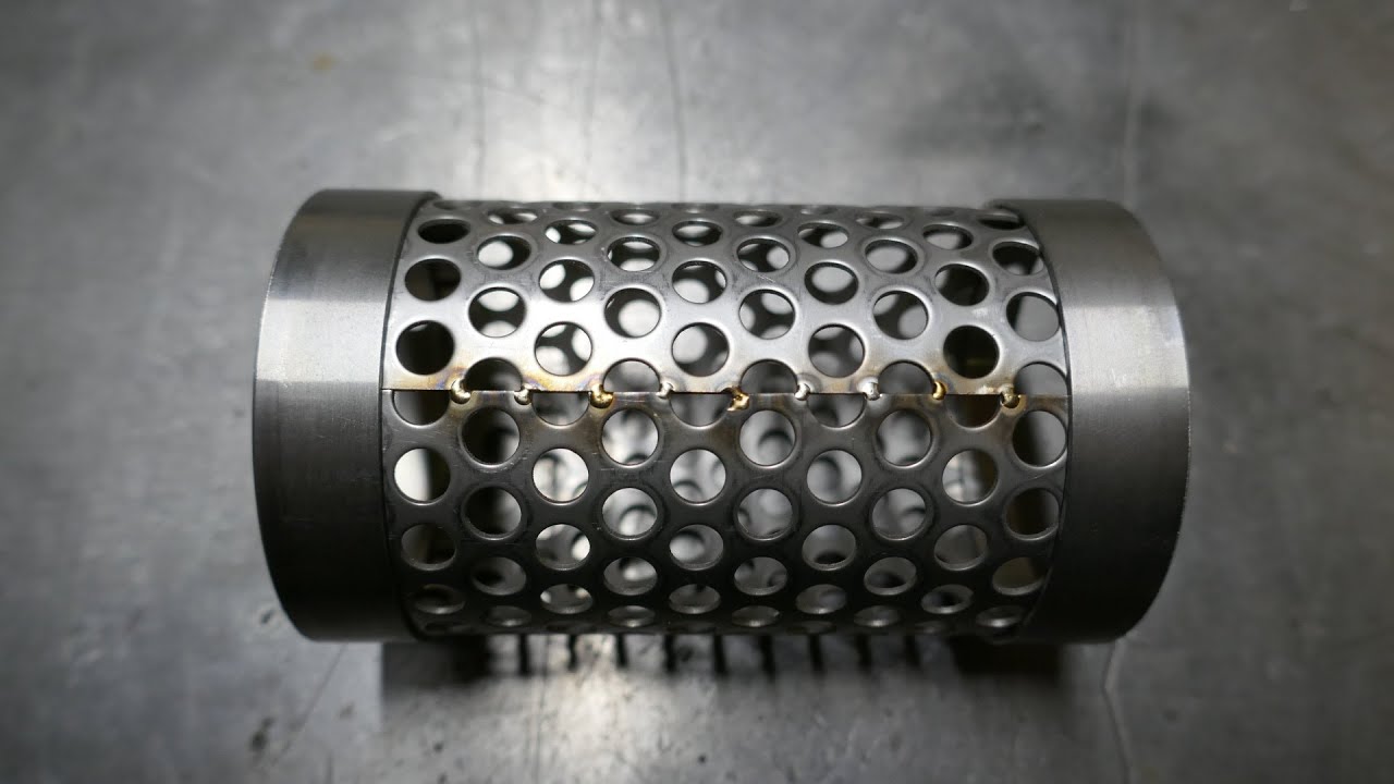 Cutting, Rolling & Welding 1mm thick Perforated Stainless Steel.