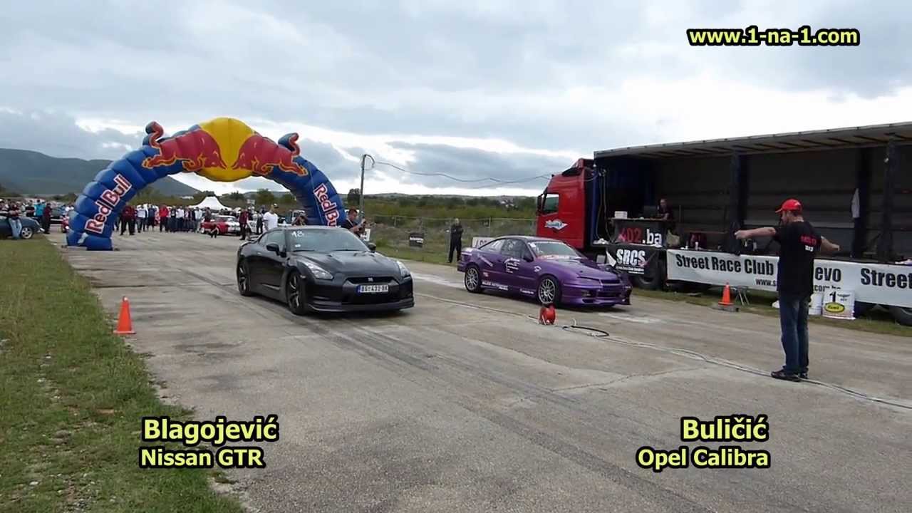 Nissan GTR vs Opel Calibra 4x4 (9 sec club)