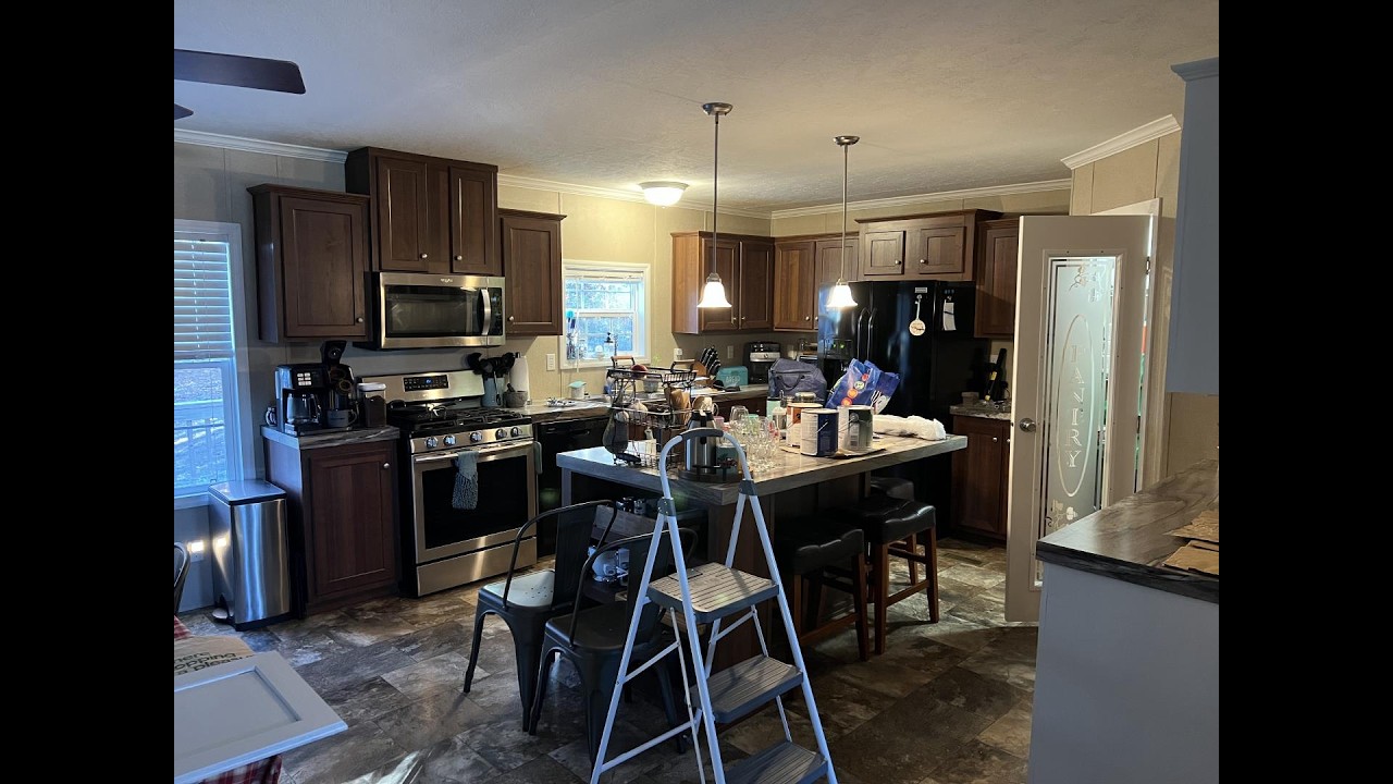 Painting dark brown kitchen cabinets white (Lake Chores 18).