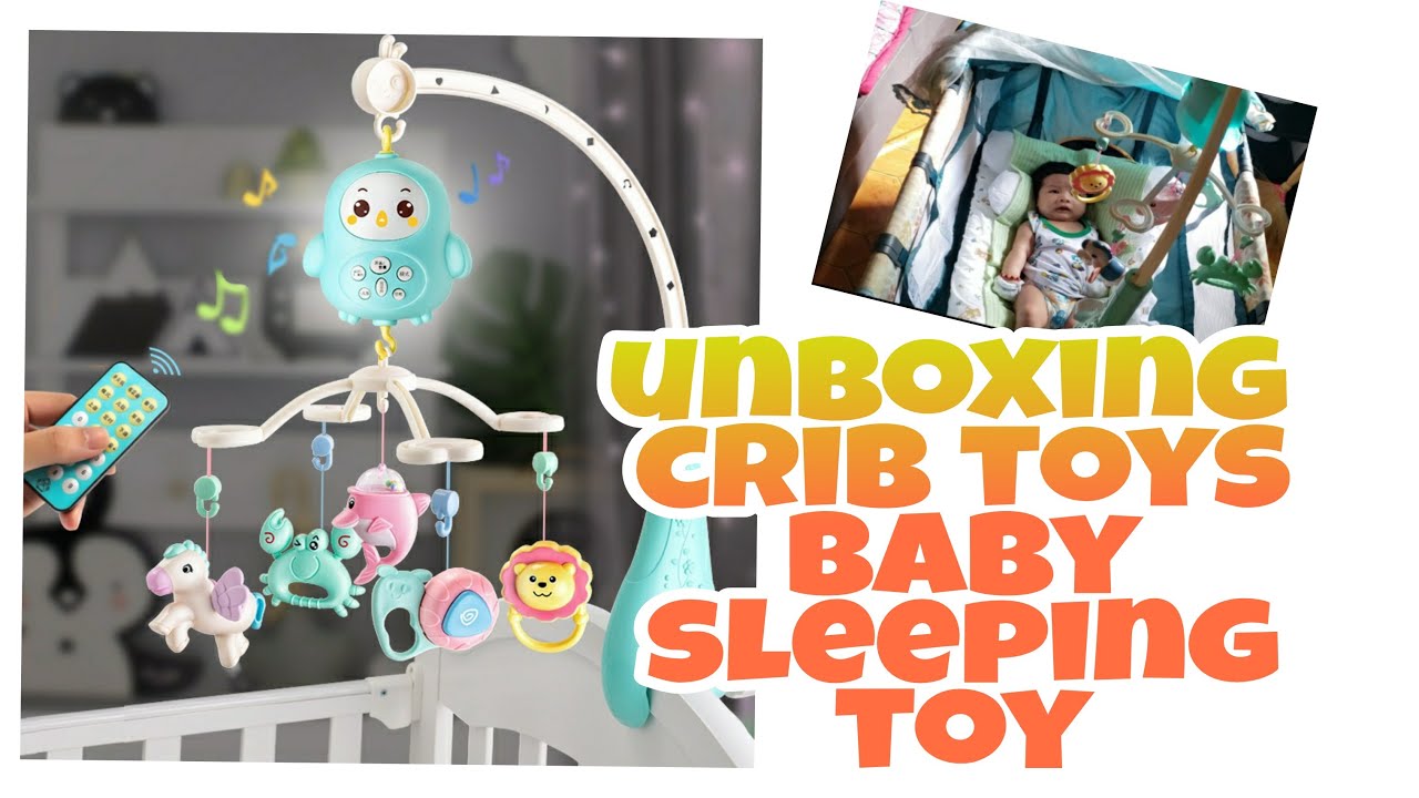Unboxing crib toys hanging with music, newborn sleeping toy
