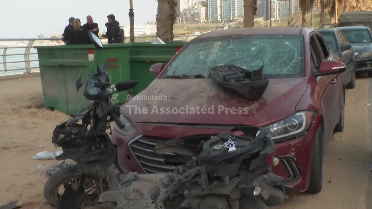 Israeli strike hits a car in central Beirut, killing at least eight people
