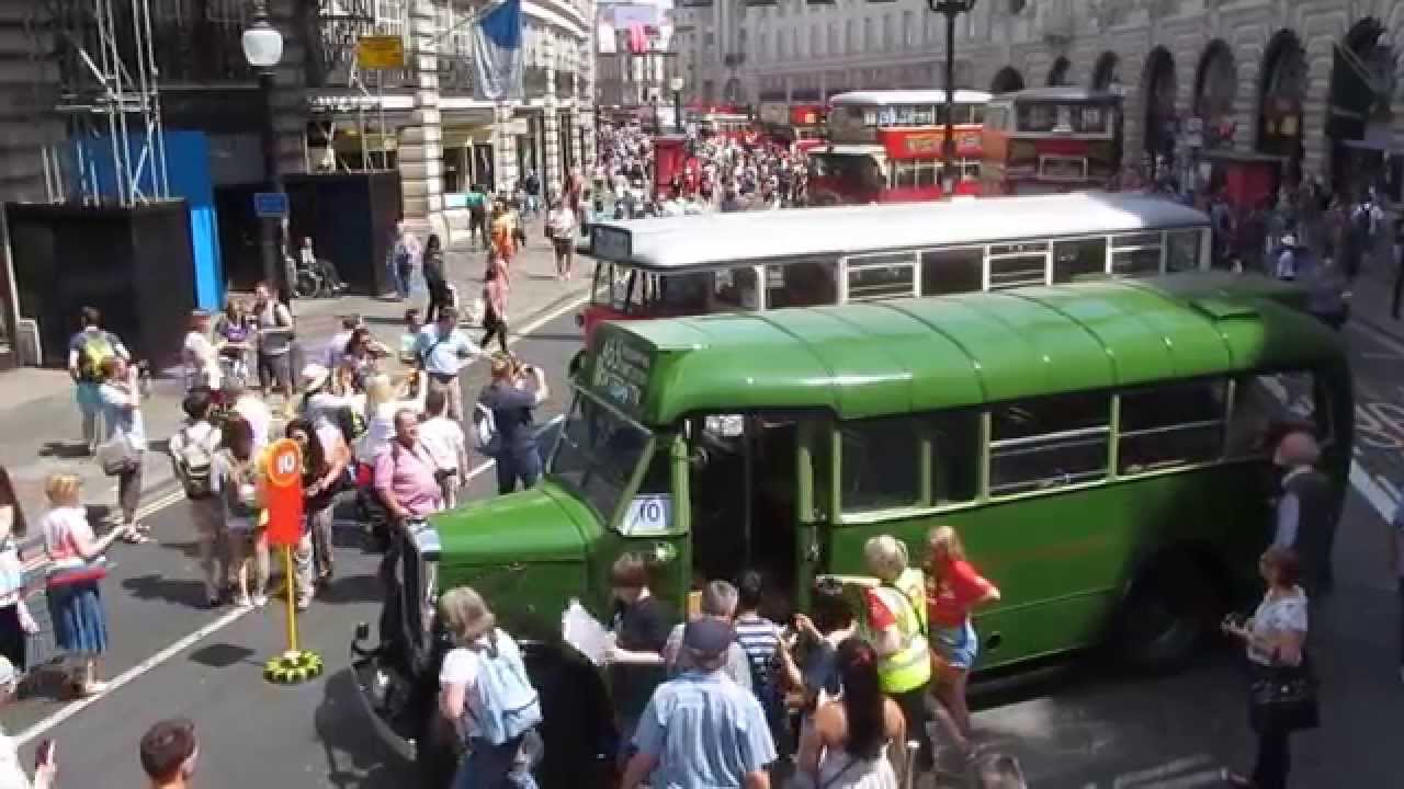 Crowds in Regent Street admiring pre-war London buses