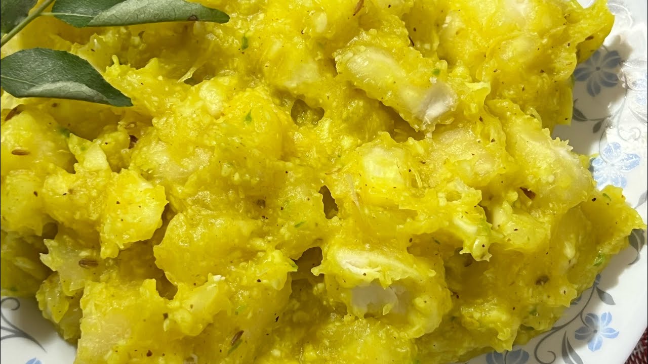 Mashed tapioca with coconut/kappa puzhukk 