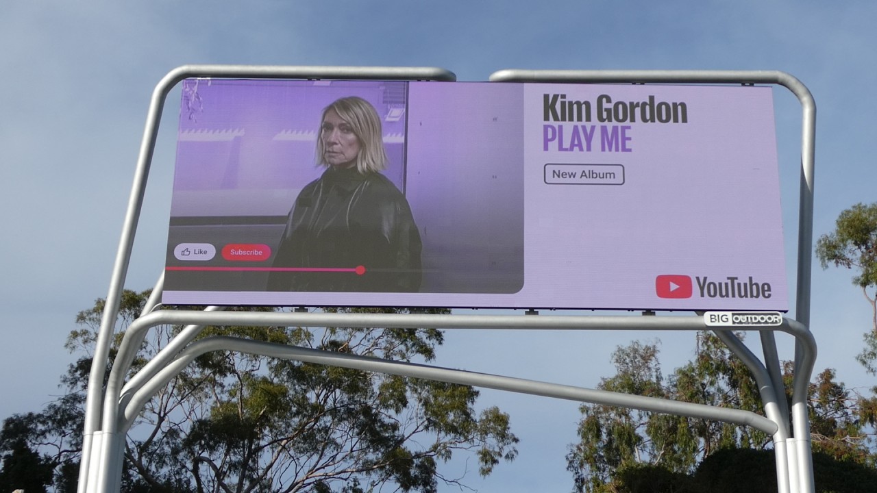Kim Gordon Play Me New Album YouTube Billboard Sunset Blvd Los Angeles California USA March 13, 2026