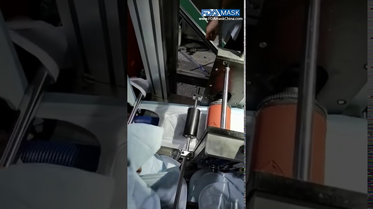 Adjusting commisioning video of automatic n95 kn95 mask making machine line run trail