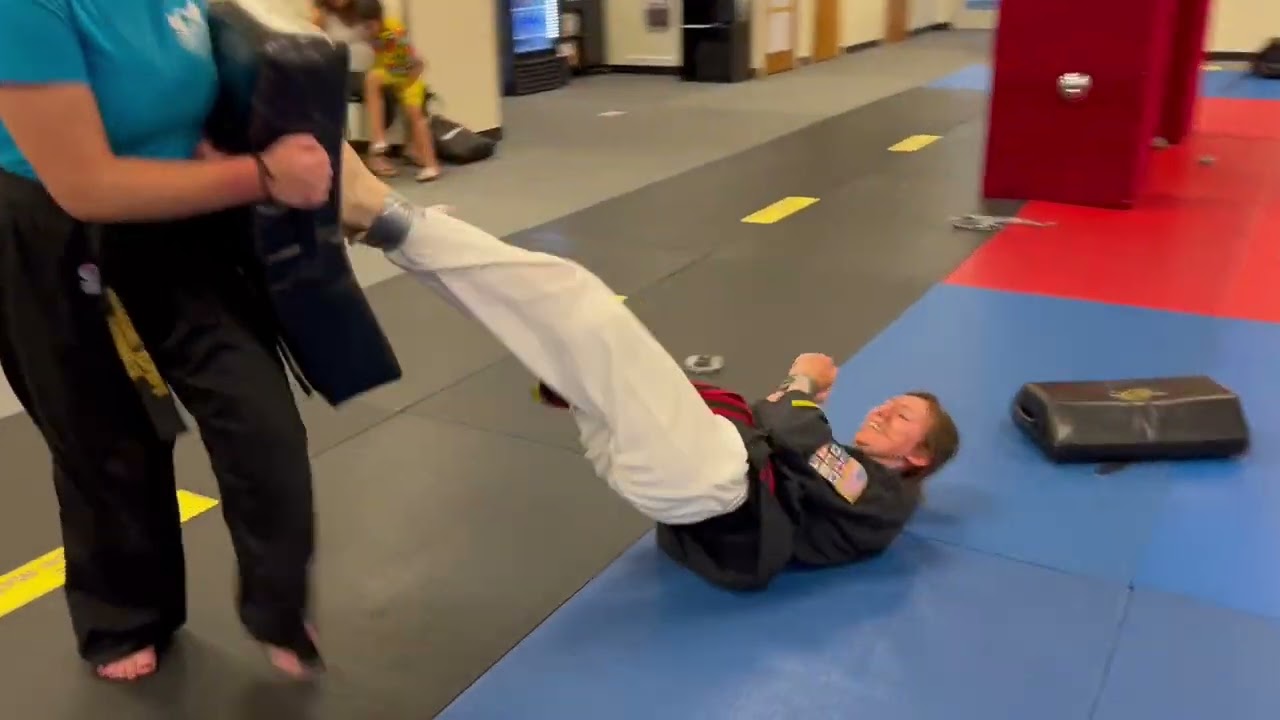 Everson's Karate Institute teens learning how to escape from being duck taped.