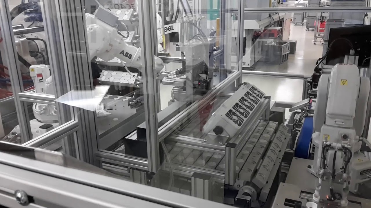 Robotic assembly cell